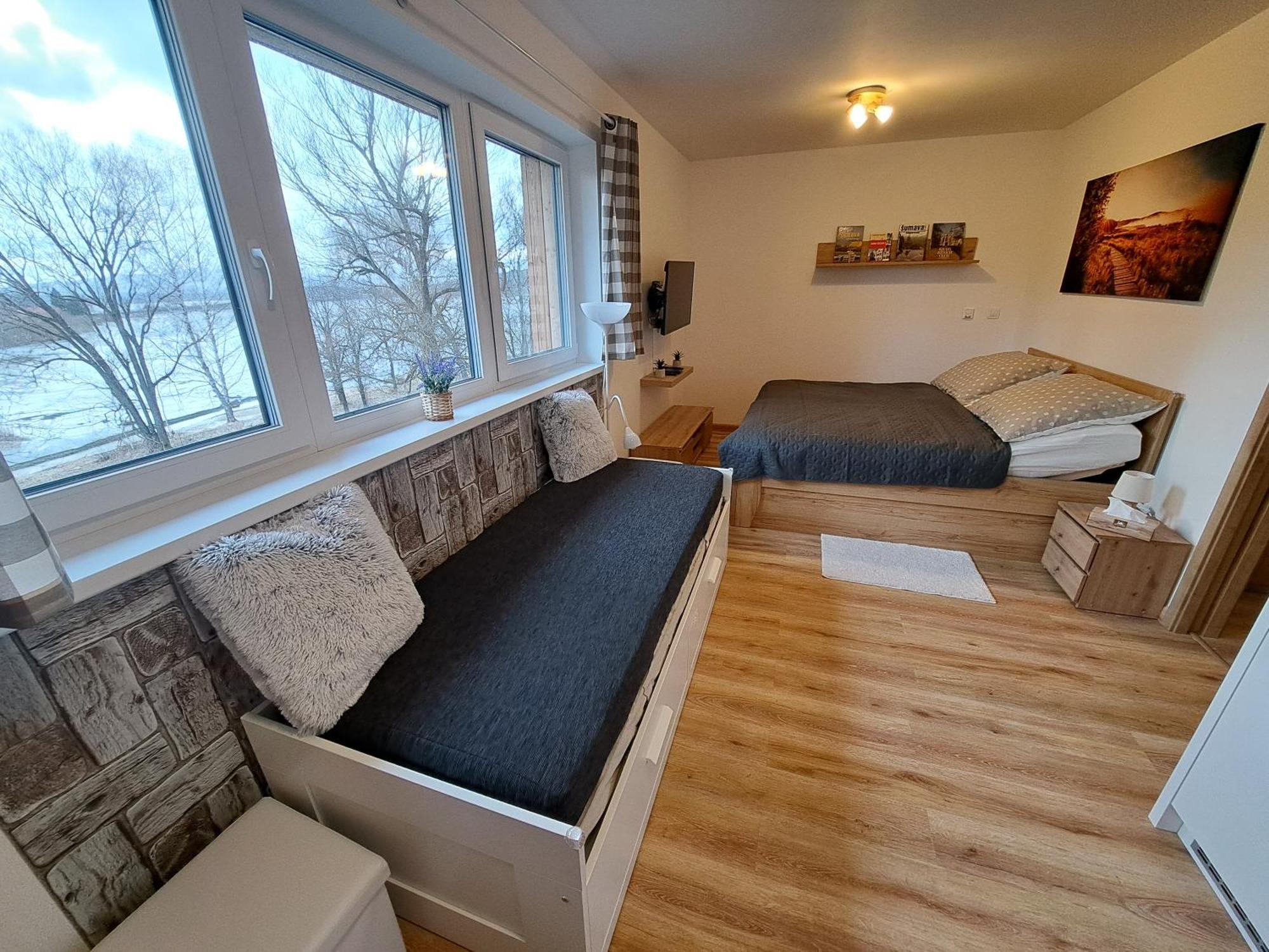Apartmany - Male Lipno Černá v Pošumaví 部屋 写真